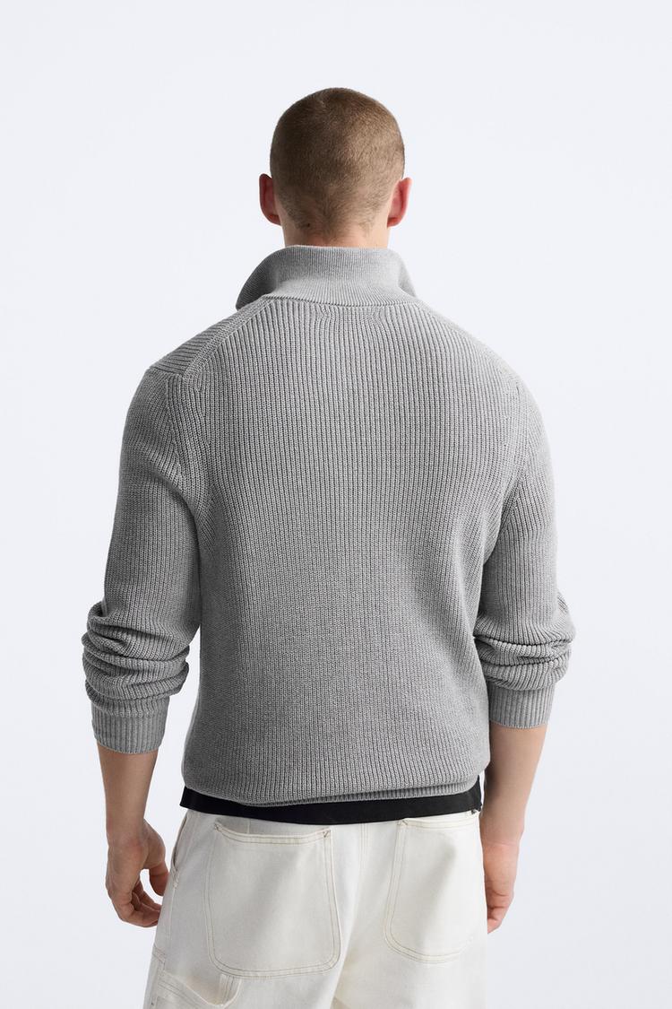 Sudadera con cremallera y cuello gris jaspeado